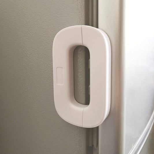 Child safety refrigerator lock installed on fridge door to keep kids safe at home in Pakistan