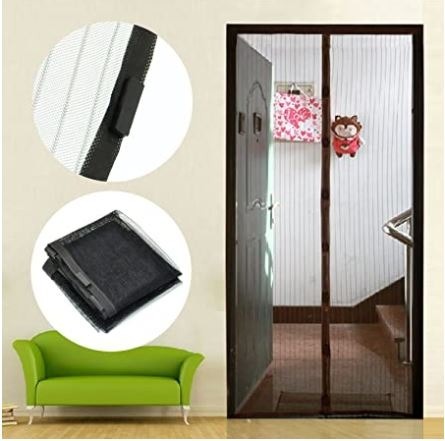 Hands free mosquito screen door keeping insects out of home