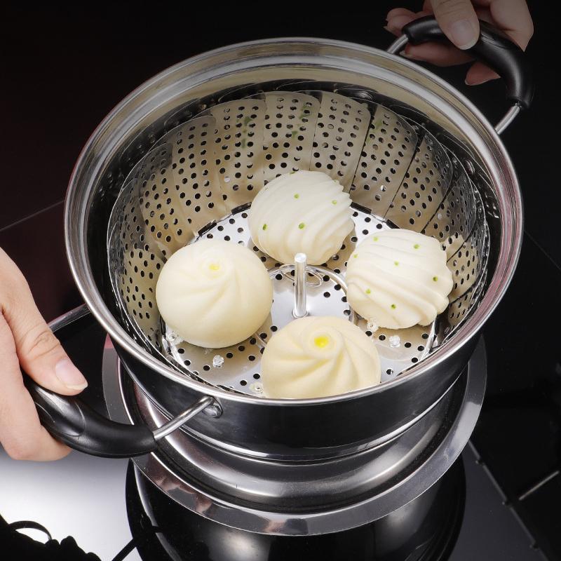 Expandable steamer basket placed inside pot for steaming vegetables and dumplings